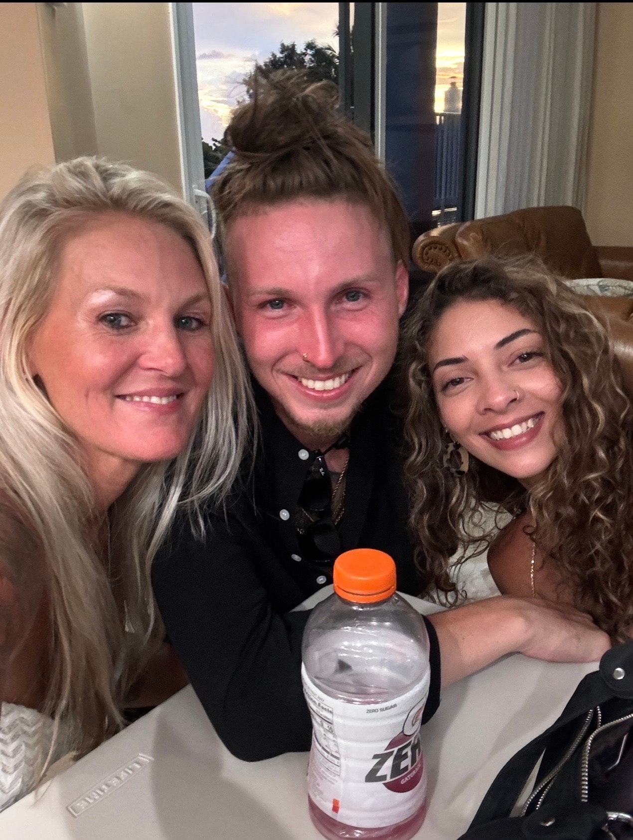 Stone with mom and girlfriend