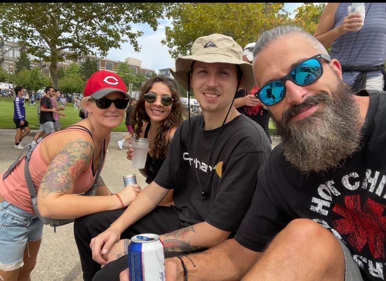 Stone with friends at a festival