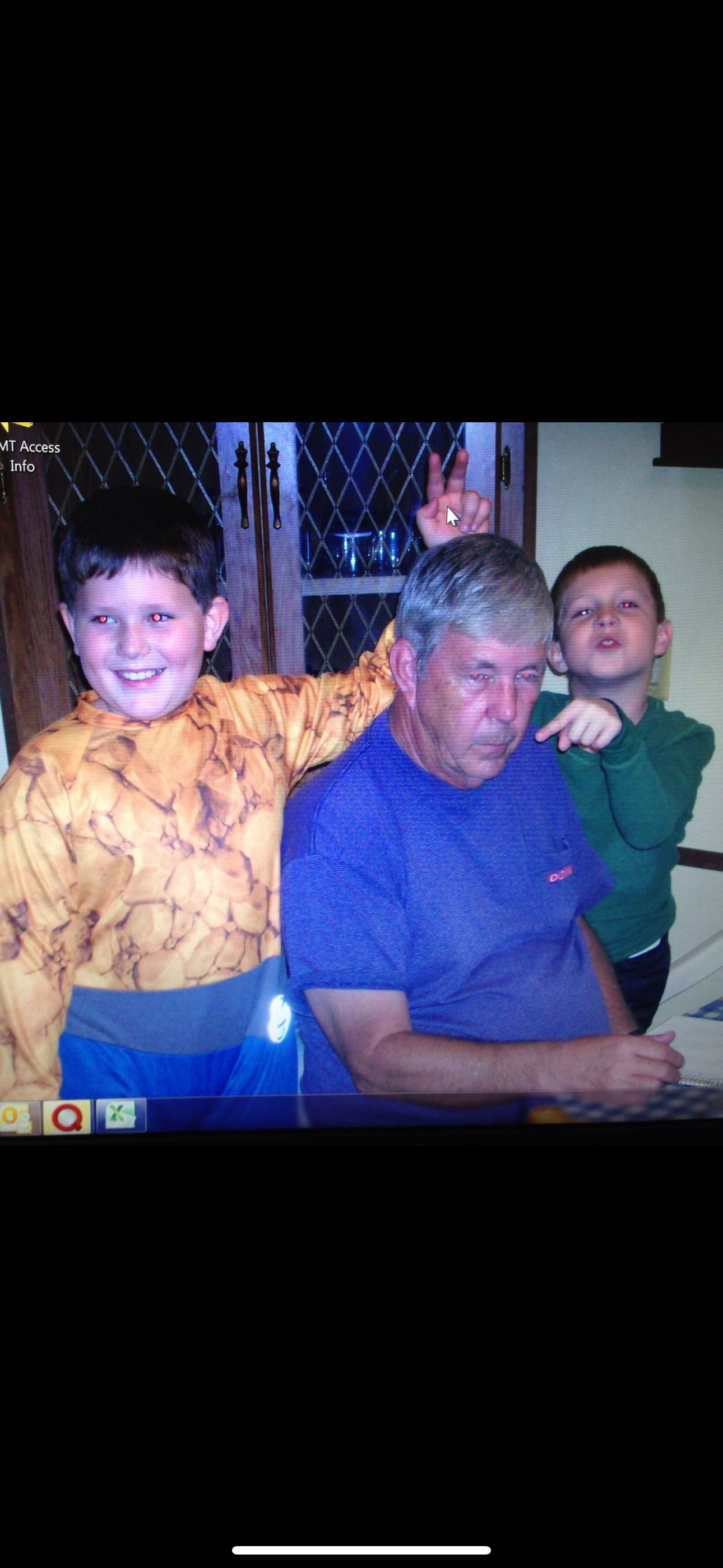 Young Stone with his grandfather and brother