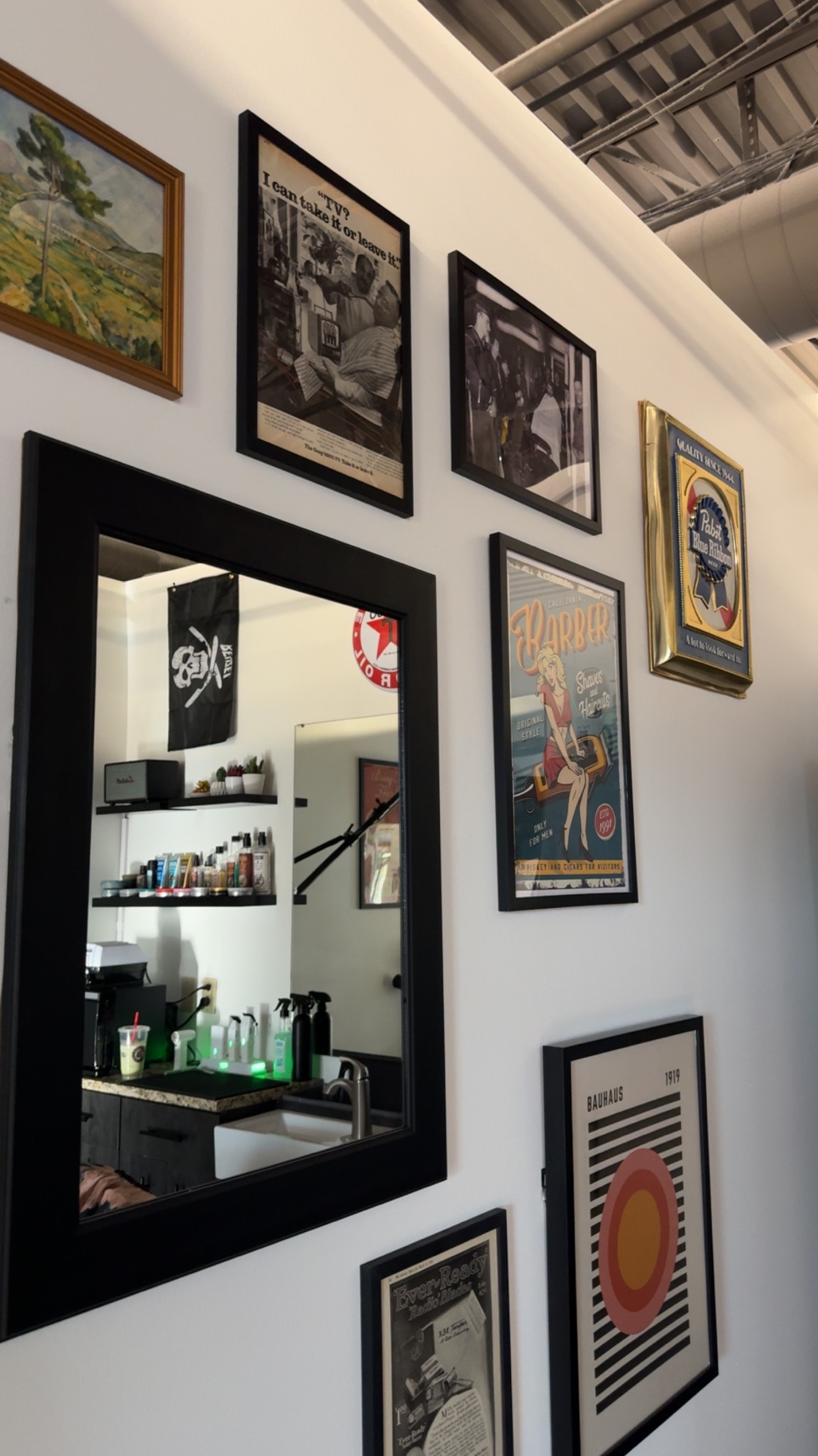 Shop mirror and gallery wall at Pat's Parlor