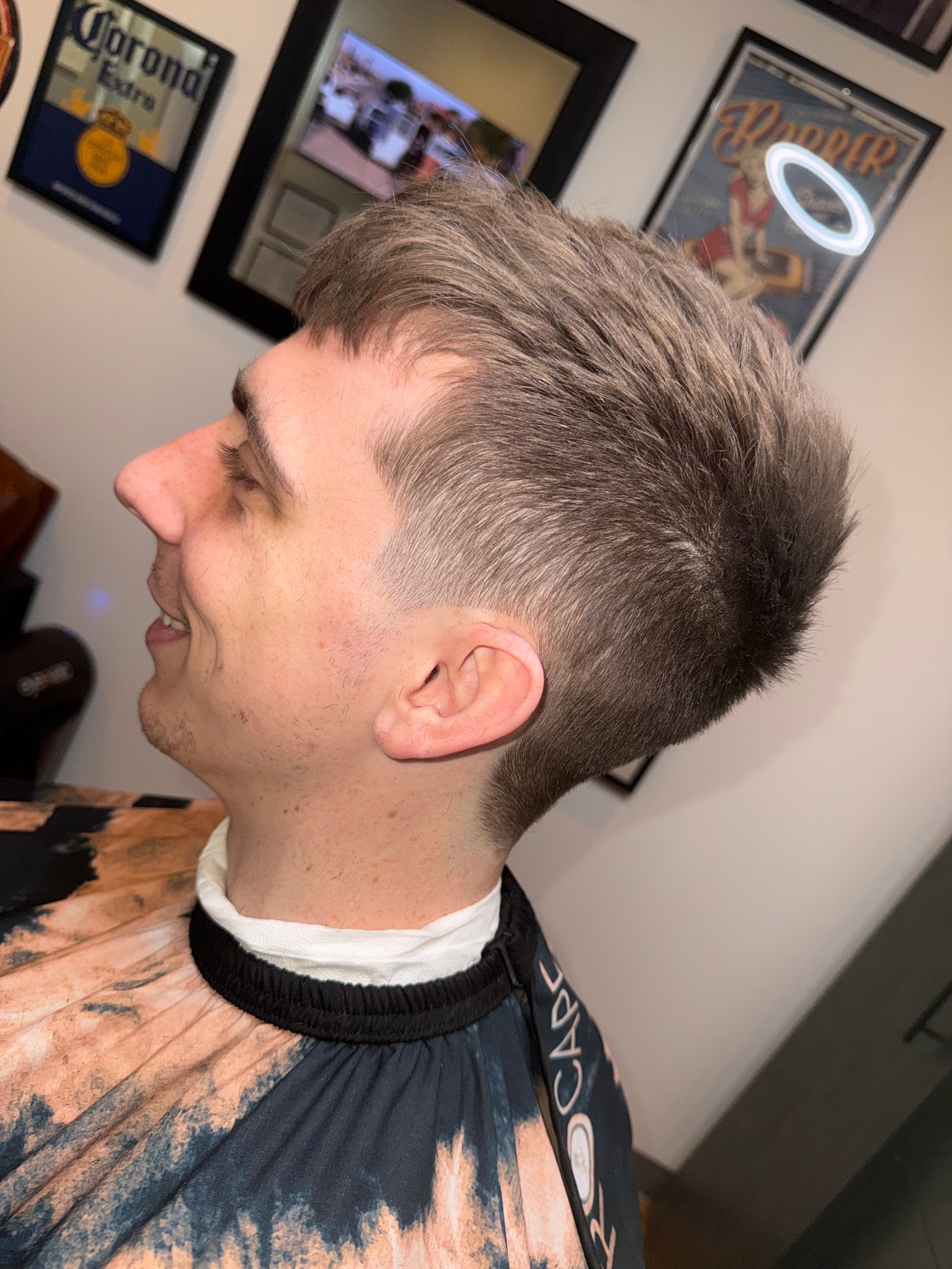 Clean taper fade side profile at Pat's Parlor