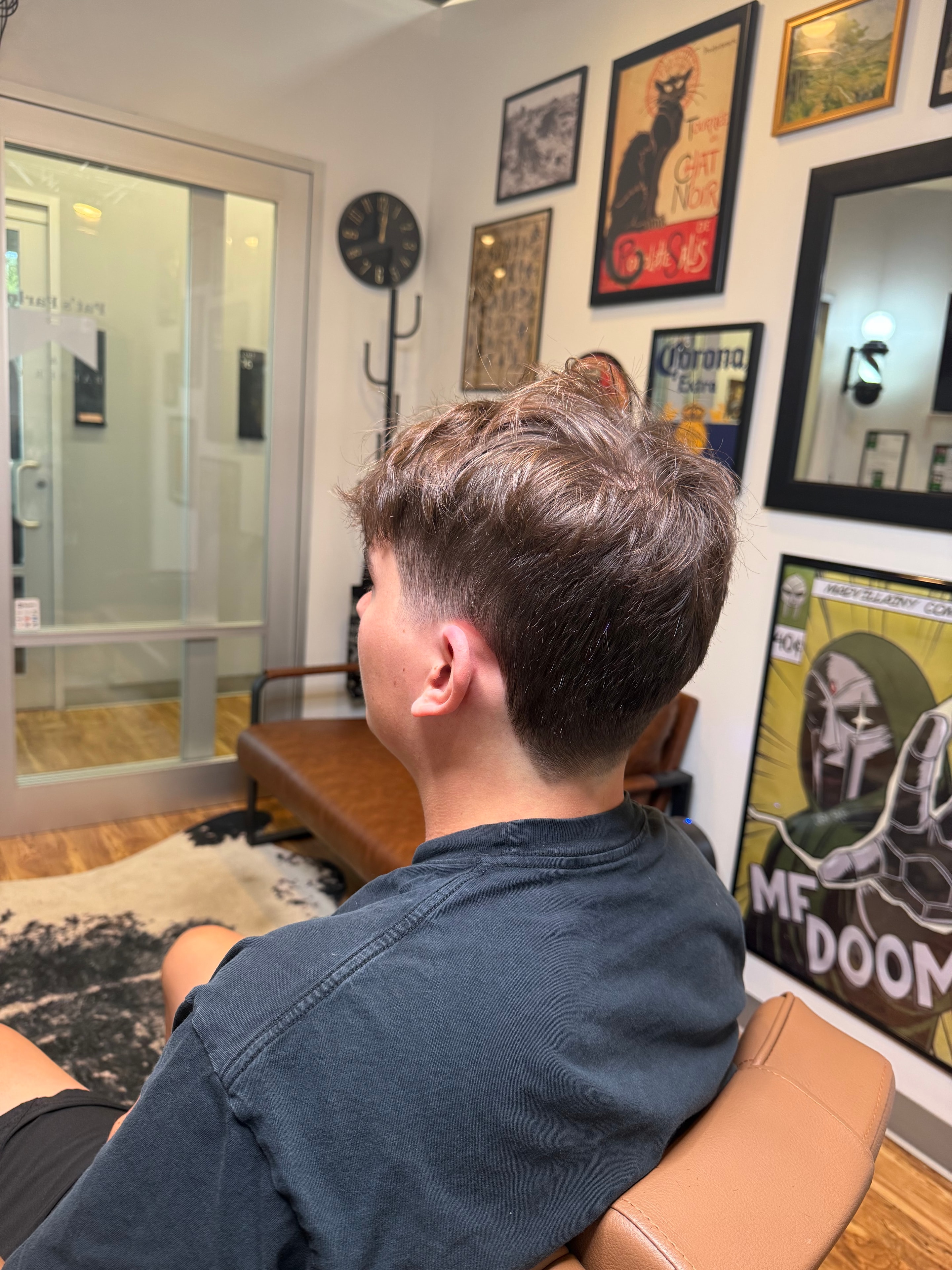Clean taper fade back view at Pat's Parlor