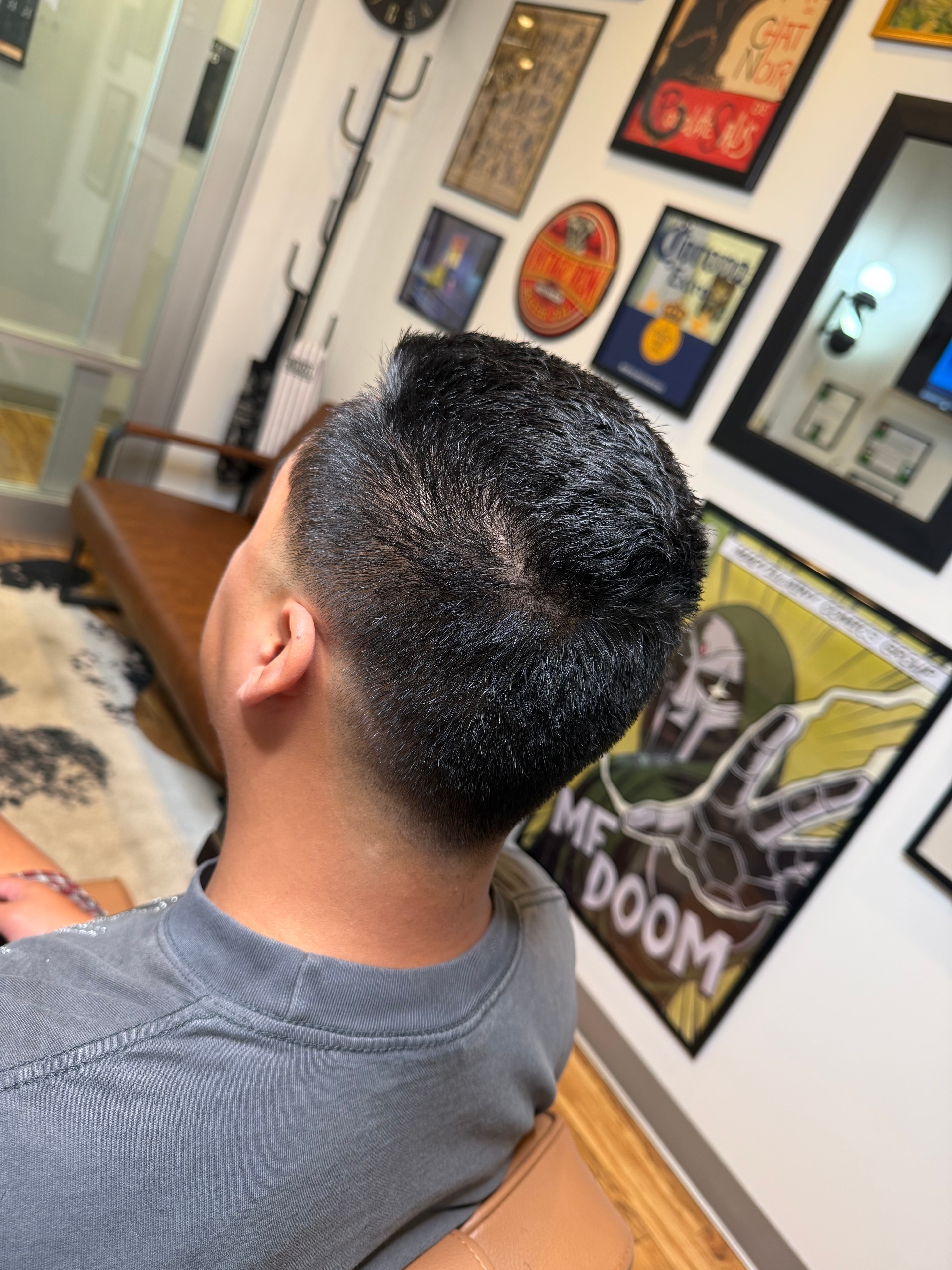 Sharp low fade back view at Pat's Parlor